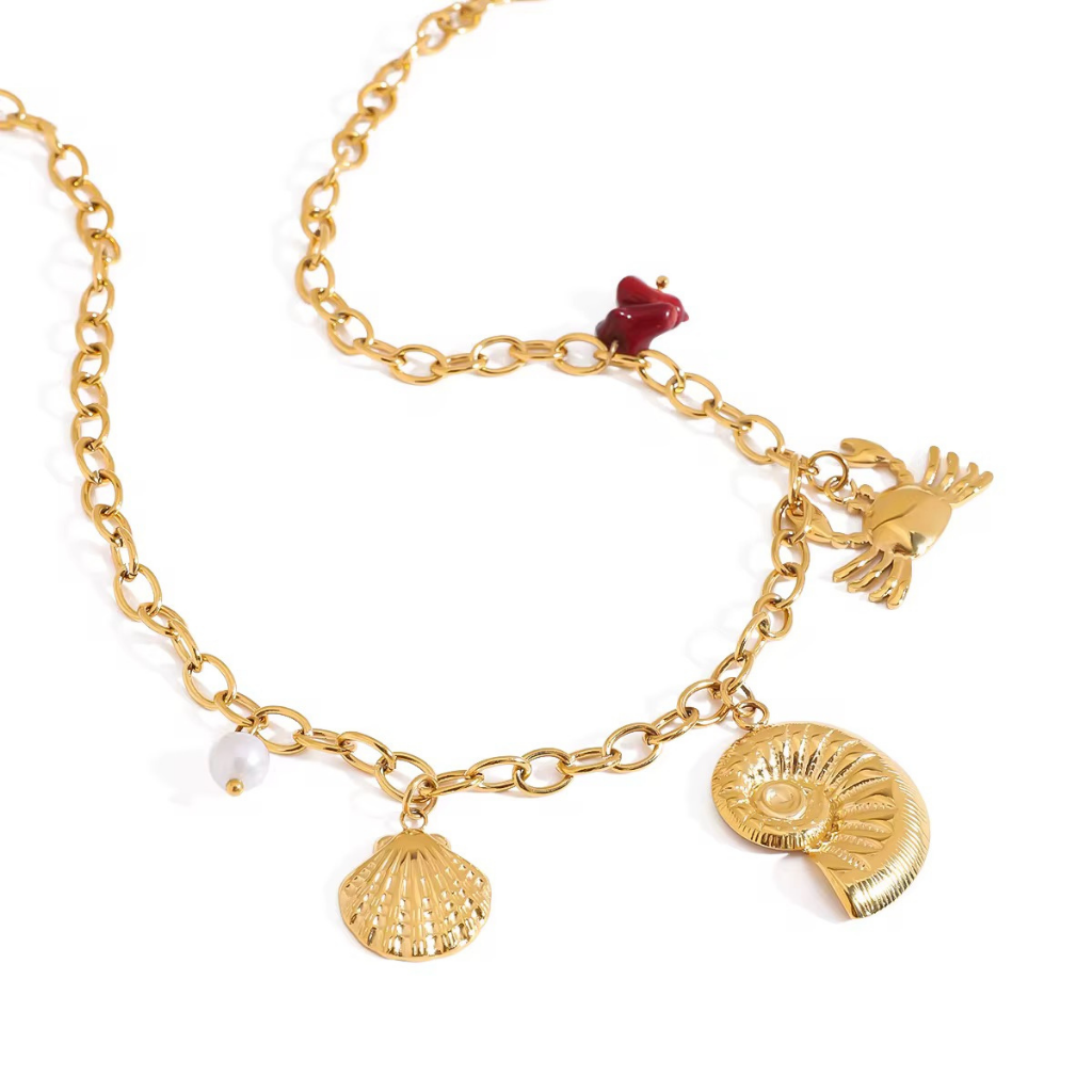 Raíz de Sal bañada en Oro 18k – Collar Dorado con Dijes Marinos