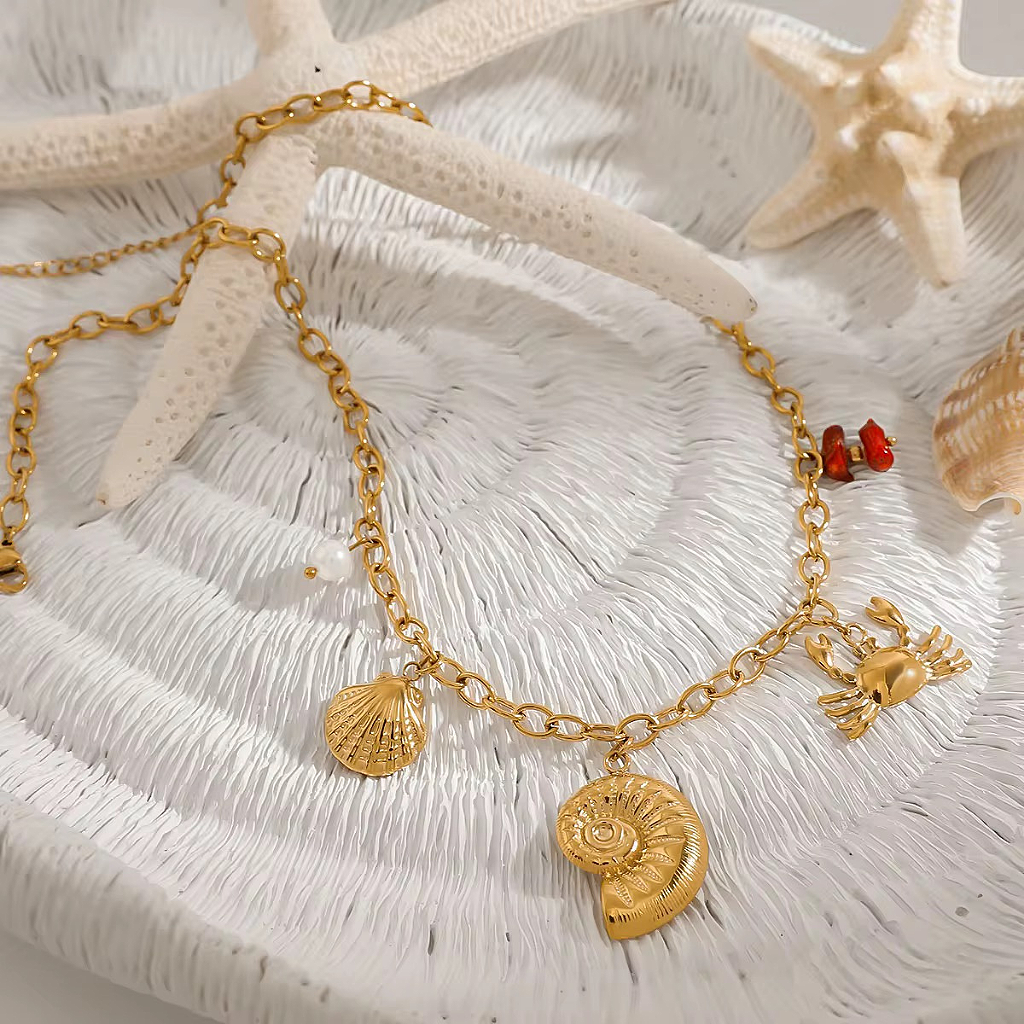 Raíz de Sal bañada en Oro 18k – Collar Dorado con Dijes Marinos