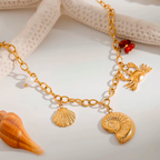 Raíz de Sal bañada en Oro 18k – Collar Dorado con Dijes Marinos