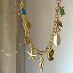 Tesoros Del Mar - Collar con dijes marinos