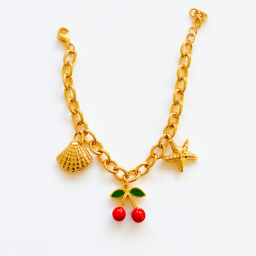 Cherry Glow – Pulsera de Eslabones Dorados con Dijes Frutales y Marinos